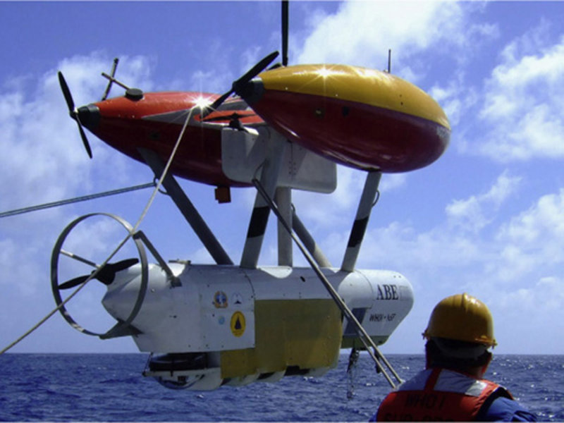 Figure 3. The autonomous benthic explorer (ABE) is a free-swimming underwater robot. In this image, ABE is about to be set loose from the Chinese research ship Da Yang Yi Hao in Spring 2007 to explore the bottom of the SW Indian Ocean. Over the past five years, ABE has been used on multiple expeditions to find new hydrothermal vents in the deep ocean all over the world, from New Zealand to South Africa and from Brazil to Ecuador.