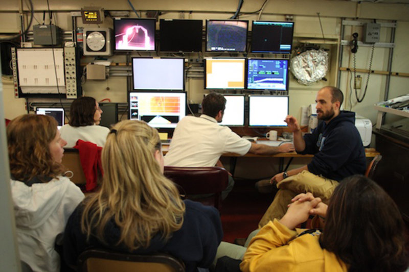 As I write this log, I’m sitting in the main lab watching Chief Scientist Andrew Thurber and 'res tech' Jim maneuver our video-equipped multi-core along the seafloor for the fourth time this cruise.