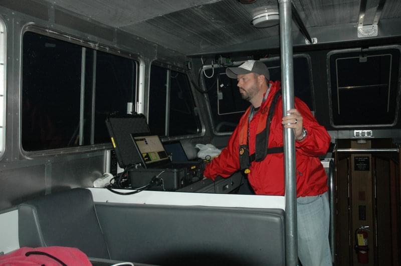 During a night-time recovery, Jonathan Hartje remotely navigates the ATLAS towards the research vessel.