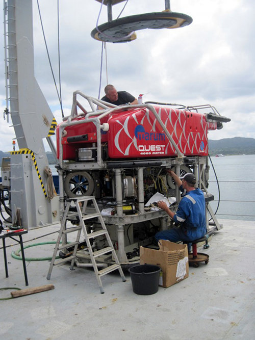 ROV technicians from the University of Bremen in Germany prepare the Quest 4000 for work in the Northeast Lau Basin shortly after arrival on the R/V Roger Revelle.