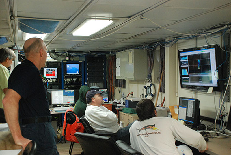 Scientists and crew await multibeam survey results, hoping to identify new shipwrecks.