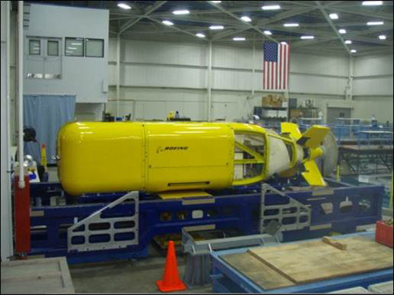 Autonomous underwater vehicle Echo Ranger in the lab prior to a 2014 mission to study rockfish in the Pacific Coast. The robot includes sonar sensors and camera systems to identify and track biological activity.