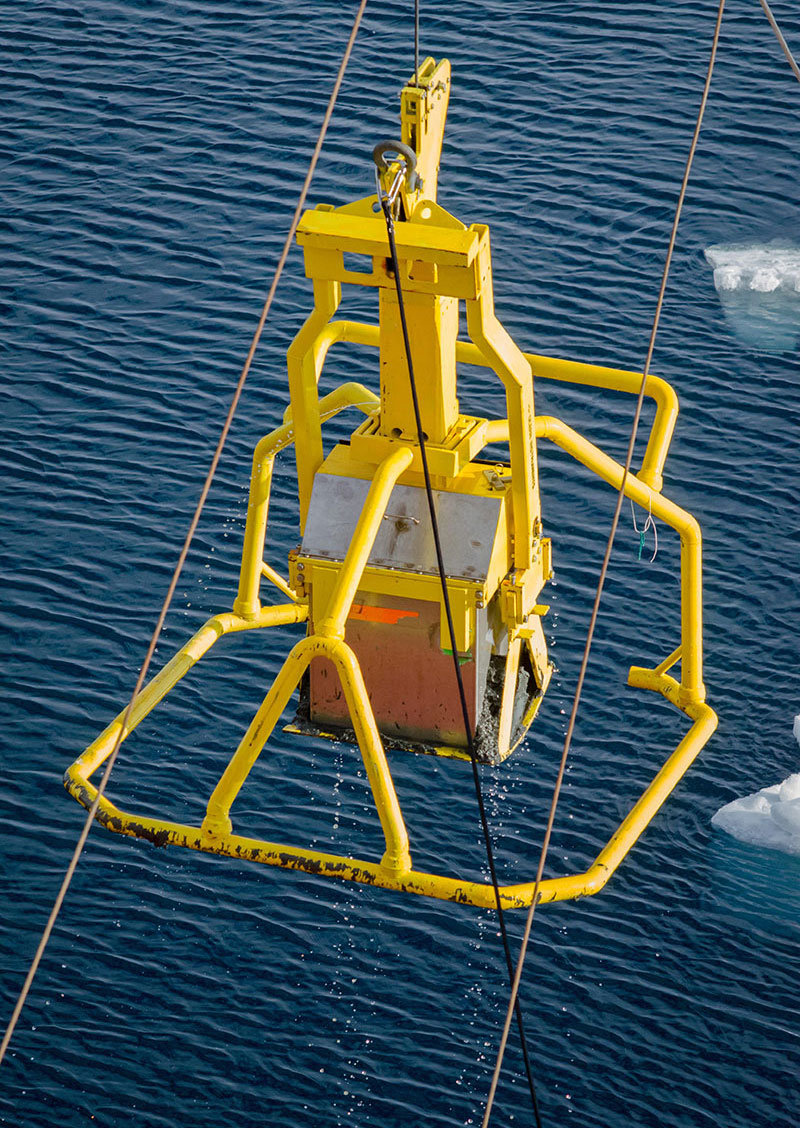 The box core instrument successfully brings up muddy sediment from the ocean bottom.