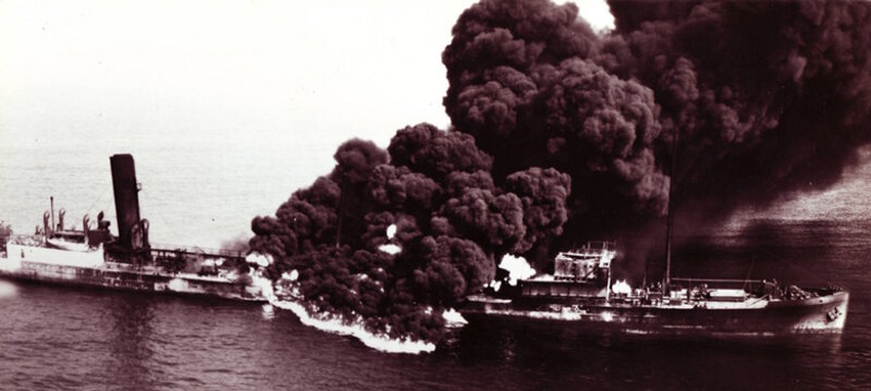 Torpedoed Tanker Byron Benson burns off North Carolina’s coast after a U-Boat attack.