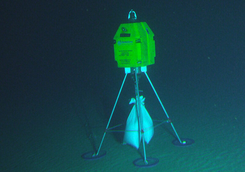 Transponder pod successfully placed on the seafloor. White sand bags were added to the pods for additional weight.
