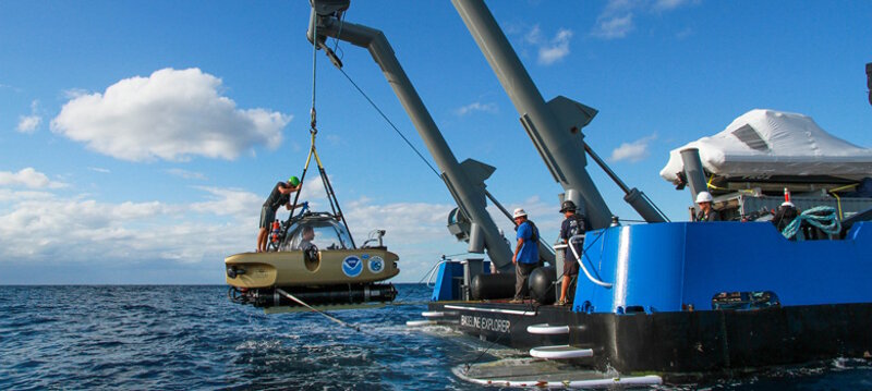 The manned submersible is being lifted out of water after its dive to the U-576 and Bluefields wreck sites.