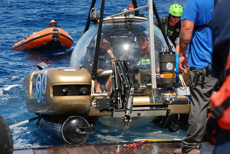 Joe Hoyt and submersible pilot Robert Carmichael (from left) inside the submersible.