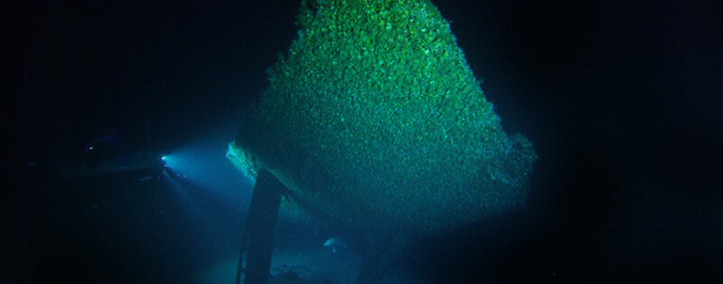 A video frame grab of the stern of U-576. The stern torpedo tube can be seen between the two rudders.