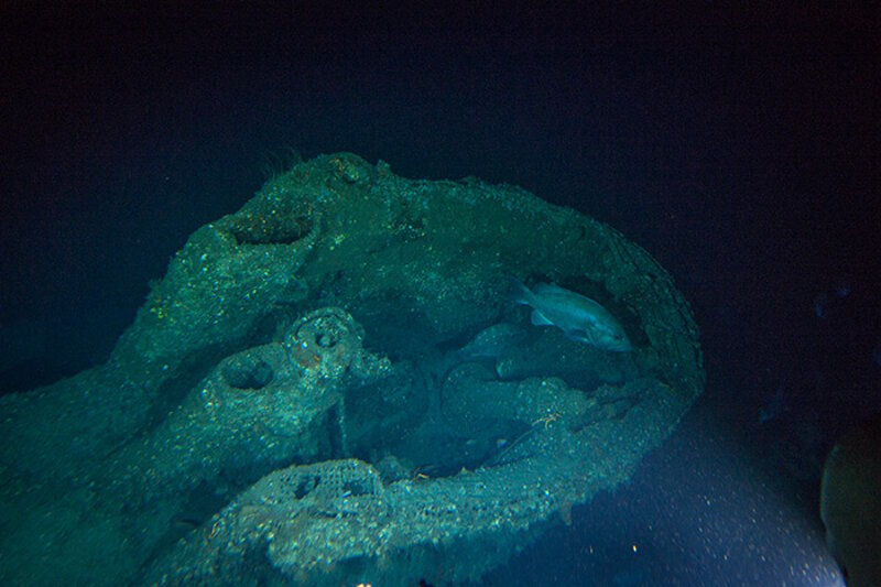 The conning tower of U-576 as viewed from the mini sub. Entry was gained to the U-boat through a watertight hatch located in the center of the conning tower. The attack periscope can be seen in the near the back of the tower.