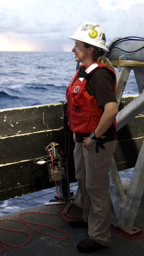 Amanda oversees the deployment of a CTD (conductivity, temperature, and depth) rosette over the side of NOAA Ship Pisces.
