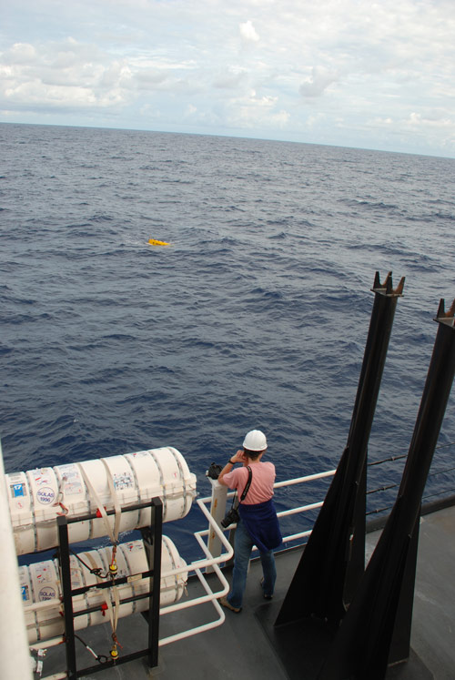 Dr. Martha Nizinski, chief scientist, watches Sentry surface after its 15-hour deployment.