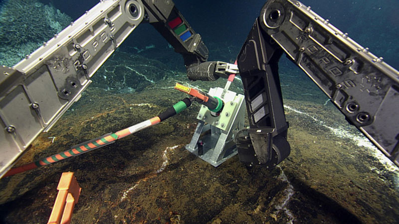 The ROPOS manipulators being used to plug in a subsea cable.