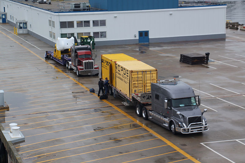 Tracker trailer trucks remain at the ready to unload ROPOS and all the equipment necessary for ROV operations.