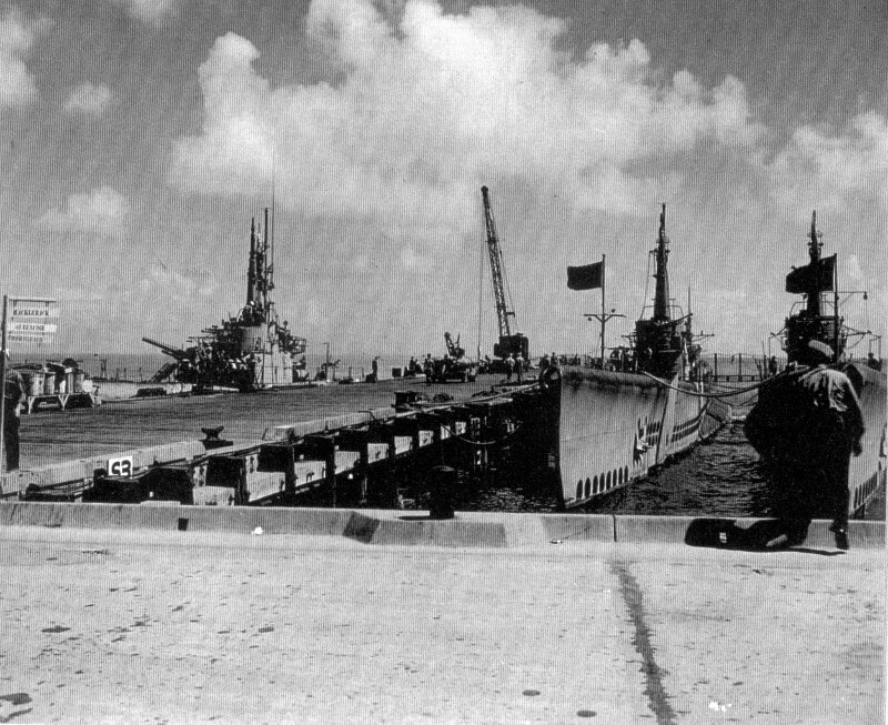 Submarines docked at Midway Atoll.
