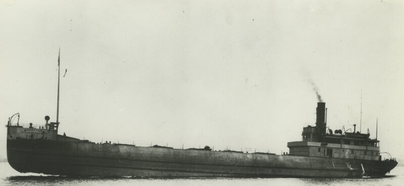 Another port-side view of Choctaw traveling light with much of its hull out of the water.