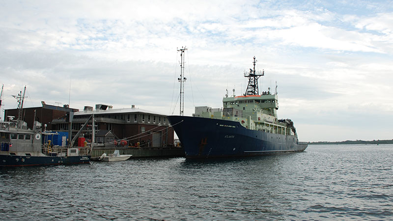 The R/V Atlantis docked at its home port at the Woods Hole Oceanographic Institution in Woods Hole, MA.