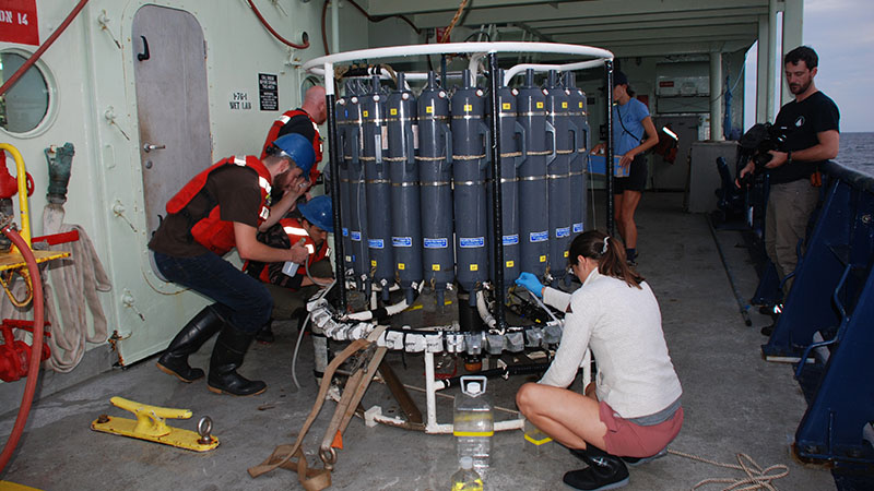 When the CTD was hauled back onto the deck, the DEEP SEARCH team immediately got to work taking water fractions. The Joye, Cordes, Demopoulos, and Prouty labs are all analyzing water from each CTD cast.