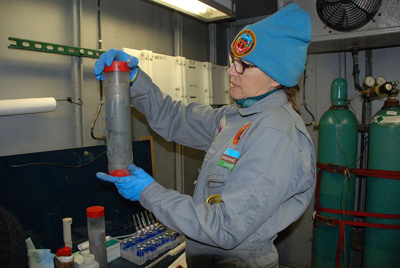 Mandy Joye inspects a sediment core before processing begins.