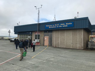 Upon arriving at Adak, visitors are greeted by a sign reading, “Alaska Birthplace of the Winds,” an appropriate description for a location that regularly experiences winter squalls with 120 mile per hour wind gusts. Adak is roughly 430 miles from Russian waters while Anchorage is 1,200 miles northeast.