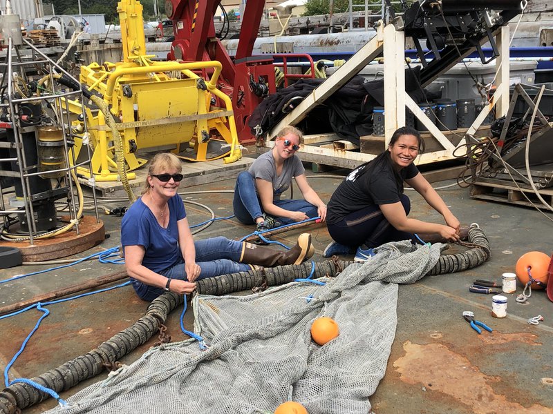 The benthic team is preparing a fish trawl net, ready to explore the deep seafloor.