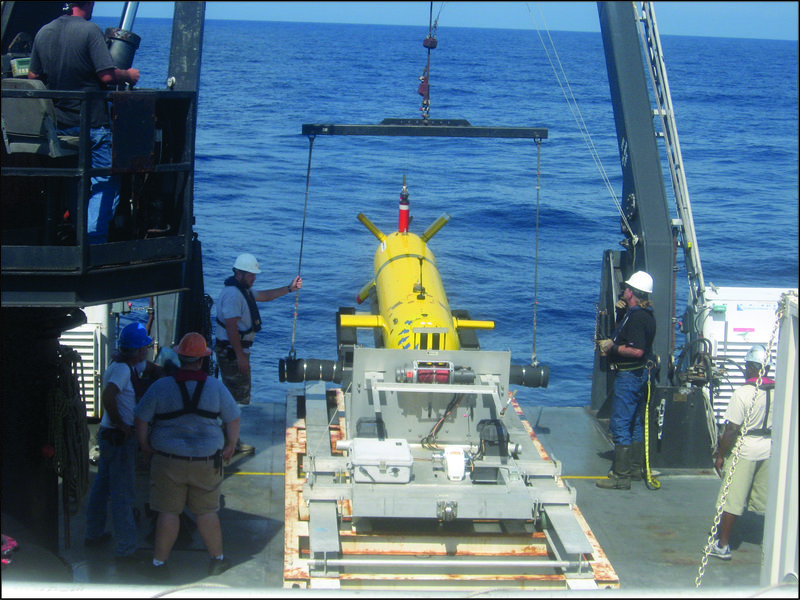 Figure 1: Eagle Ray ready to be deployed from the deck of NOAA Ship Nancy Foster and on the water before the immersion.