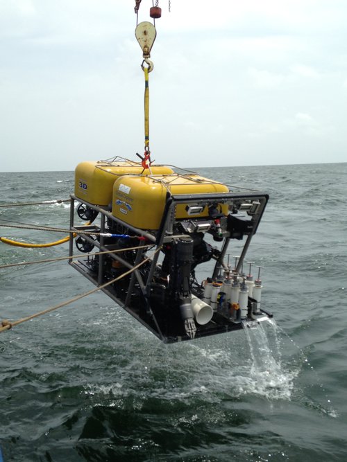 Figure 3. Global Explorer ROV being recovered after a shipwreck investigation in 2014. A seven-function manipulator arm, Jason-style push cores and still and video cameras support discovery.