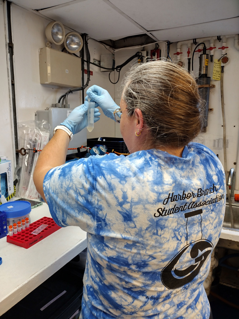 Megan Conkling, laboratory research coordinator and doctoral student at Florida Atlantic University’s Harbor Branch Oceanographic Institute, resuspends sponge cells for cryopreservation in the lab aboard Research Vessel Point Sur during the Exploring the Blue Economy Biotechnology Potential of Deepwater Habitats expedition.