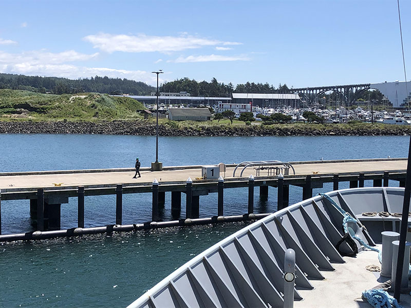 Research Vessel Thomas G. Thompson approaches the dock in Newport, Oregon, marking the end of the Escanaba Trough: Exploring the Seafloor and Oceanic Footprints expedition.