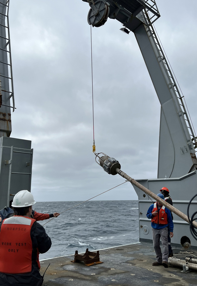 The gravity core sampler is deployed from Research Vessel Thomas G. Thompson during the Escanaba Trough: Exploring the Seafloor and Oceanic Footprints expedition.