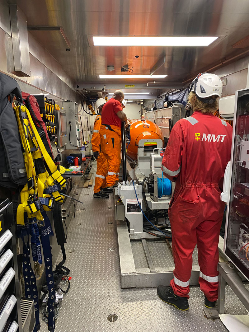 Ocean Infinity operators prepare the HUGIN autonomous underwater vehicle for launch during 2022’s Investigation of an Historic Seabed Mining Test Site on the Blake Plateau.