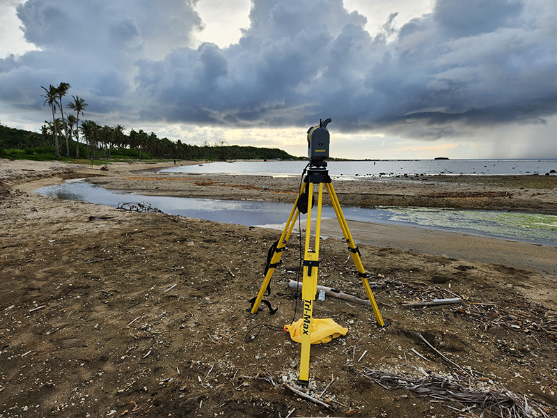 A Trimble SX10 scanning total station used to collect elevation data. Photo is looking eastward showing the new configuration of the river mouth and delta after Typhoon Mawar.