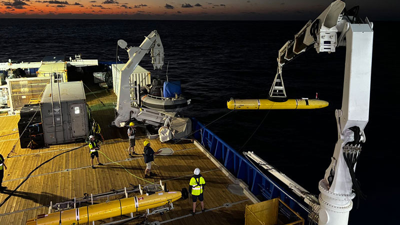Night-time launch of an autonomous underwater vehicle used to map the seafloor in high resolution and detect signs of hydrothermal activity during the In Search of Hydrothermal Lost Cities expedition.