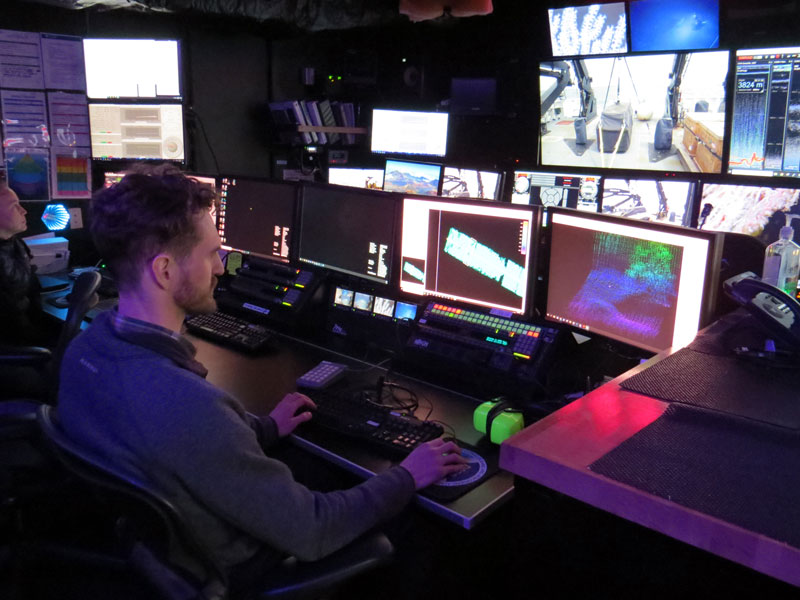 Mapping watchstander Cameron Kuhle, an Explorer-in-Training on the Seascape Alaska 1: Aleutians Deepwater Mapping expedition, "cleans" multibeam sonar data to ensure consistency and accuracy.