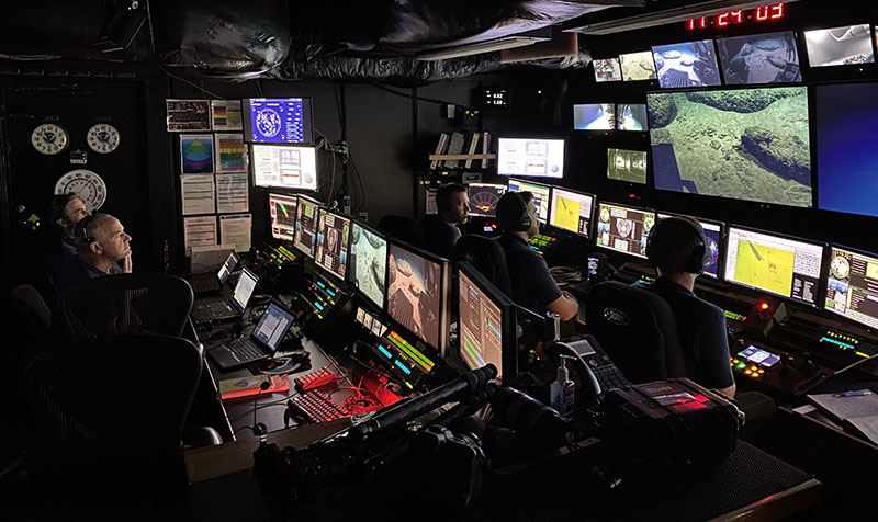 During the 2022 ROV and Mapping Shakedown, engineers in the control room on NOAA Ship Okeanos Explorer assisted with and observed the shoreside piloting of remotely operated vehicle Deep Discoverer.