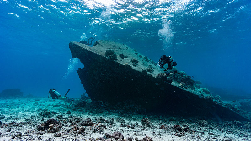 Task Force Dagger Foundation veteran divers inspect the bow of the sunken World War II Japanese shipwreck Shoan Maru. It carried conscripted Korean soldiers when it was sunk by the U.S. military in the harbor in Saipan.