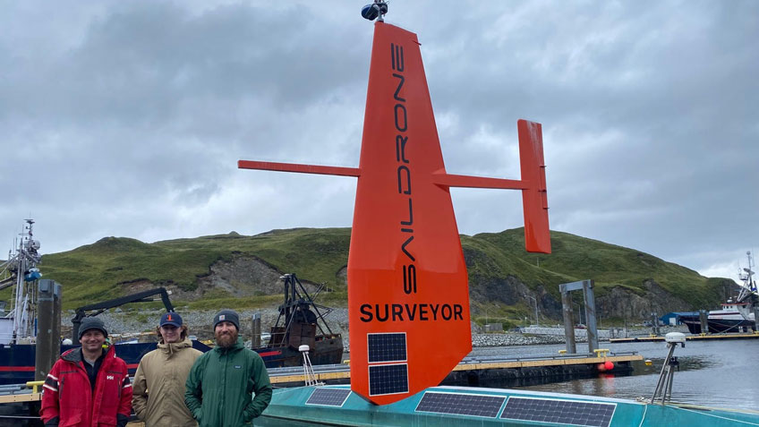 Saildrone field team members with the Saildrone Surveyor while in port in Dutch Harbor, Alaska.