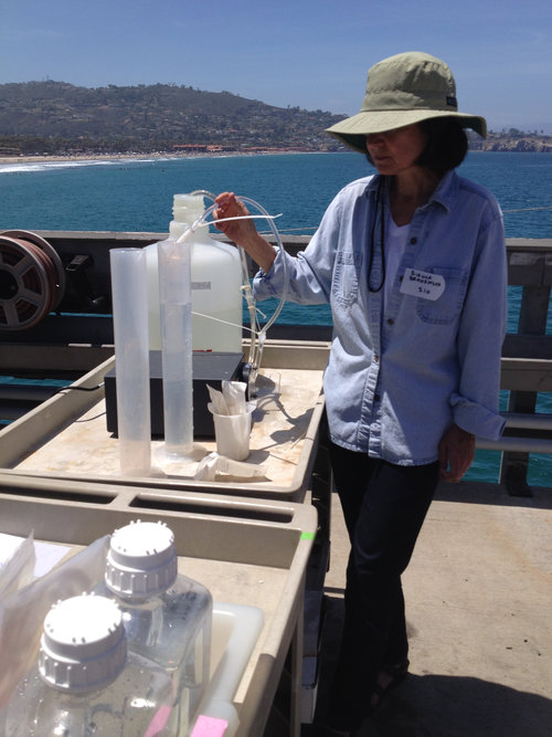 Scripps Pier site, La Jolla, California: Filtering seawater to collect marine microbes on special filters.
