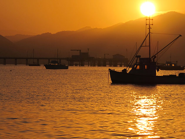 A view of the sunrise over the Cal Poly Center for Coastal Marine Sciences research pier in Avila, Ca. on September 10, 2012.