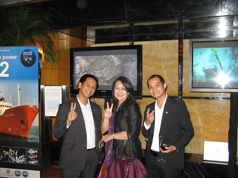 Members of the US Embassy Jakarta IT team (left to right: Pak Awang, Ibu Melly, and Pak Yudi) pose in front of displays about INDEX SATAL 2010 outside the ballroom of Embassy Jakarta’s annual 4th of July party. Help from the IT team was critical to developing the Jakarta Exploration Command Center, and continuing to ensure it runs smoothly.