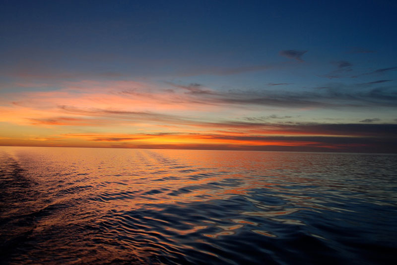>The sunsets in the Celebes Sea have been remarkable. The light, oranges and pinks and reds, wrap around the whole ship, providing a 360-degree show. These are the nights that make being at sea a special experience.