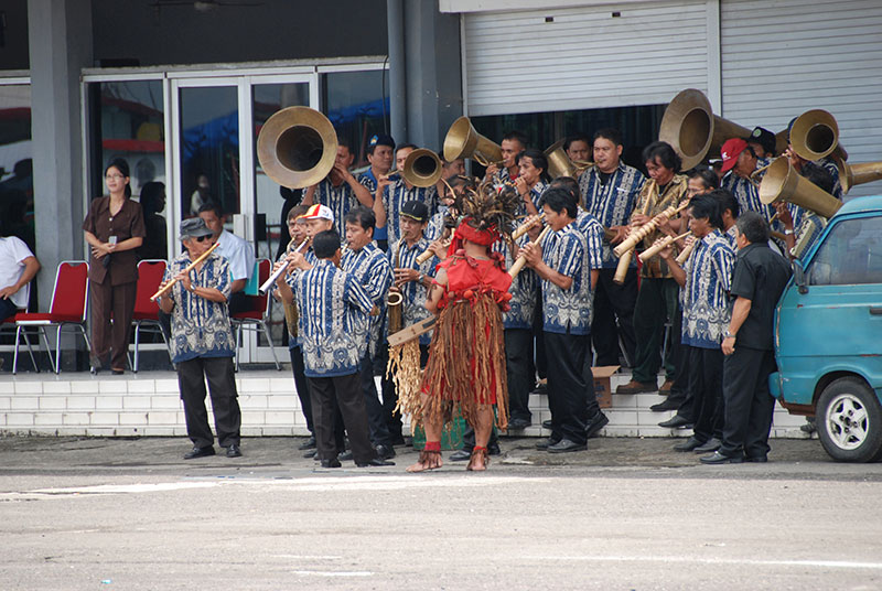  The combination bamboo and brass instrument band was just one of many surprises in store for NOAA Ship Okeanos Explorer personnel during the June 23 Welcoming Ceremony in Bitung, Indonesia. 