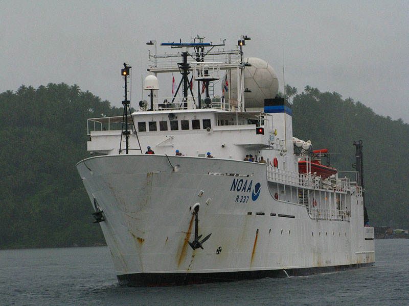 In preparation for the INDEX-SATAL 2010 expedition, NOAA Ship Okeanos Explorer slowly approaches the pier in Bitung, Indonesia, on the morning of June 20, 2010.