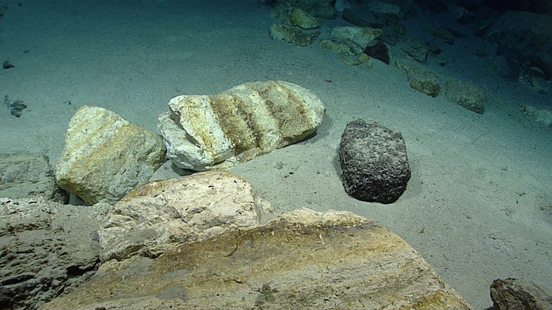 Layered pyroclasts (rock fragments produced by volcanic eruption) seen during the first dive of the third Voyage to the Ridge 2022 expedition.