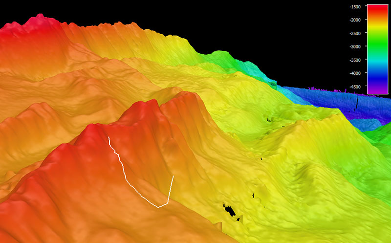 The dive track (white line) taken by ROVs Deep Discoverer and Seirios during Voyage to the Ridge 2022 Expedition 3, Dive 04: Western Kane Transform Fault. Bathymetry shown at two-times vertical exaggeration. Scale is water depth in meters.