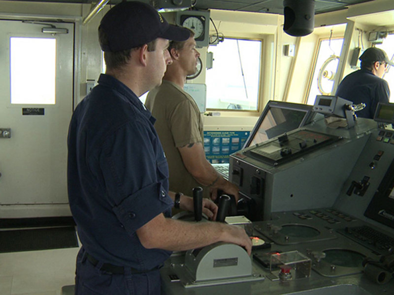 Matt O’Leary, Jerrod Hozendorf, and Brian Kennedy on the bridge of the NOAA Ship Okeanos Explorer.