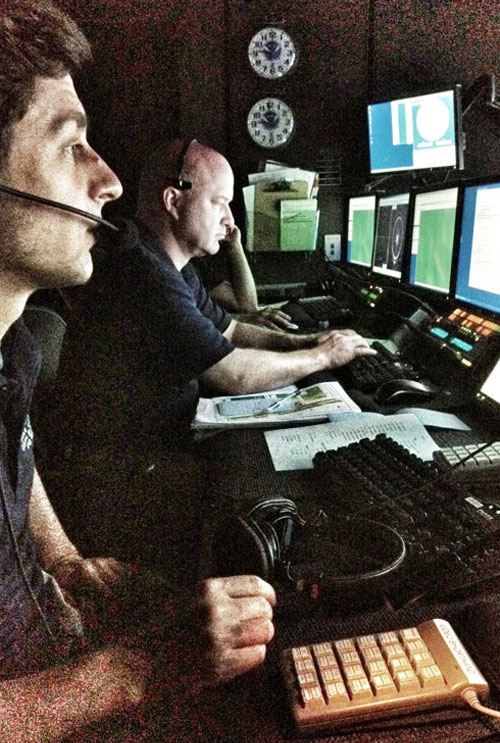 ROV control room: After seven months away from the ship, Video Engineer Gregg Diffendale and Science Team Lead Tim Shank back in the ROV Control Room.