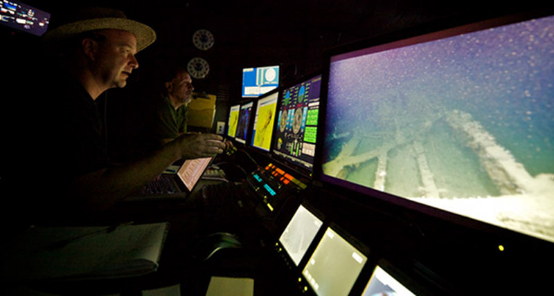 Tim Shank and Dave Lovalvo ensure science and operational objectives are met while exploring a shipwreck.