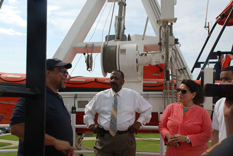Chief Electronics Technician for the Okeanos Explorer Richard Conway explains technology in the satellite dome to the Port of Houston Authority’s Robert Morgan and Dianna Kile, District Manager for U.S. Congressman Ron Paul. Morgan is the port’s Maritime Academy manager and Kile manages the congressman’s district office in Lake Jackson, Texas.