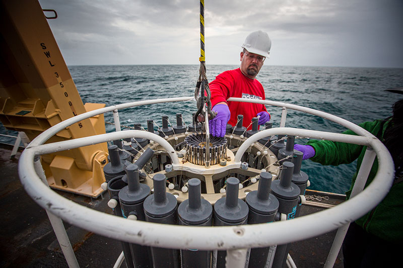 Dr. Brendan Roark preps the CTD rosette onboard NOAA Ship Okeanos Explorer.