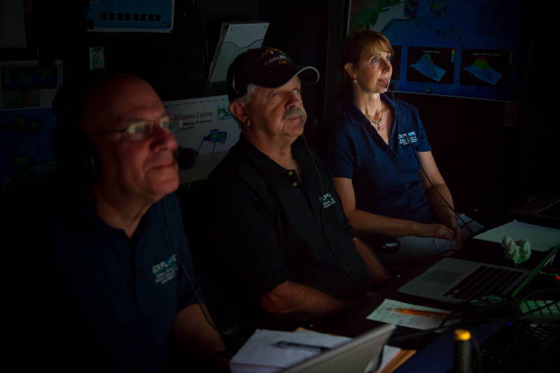 Jesse Aussebell, Jamie Austin, and Melissa Ryan engage with the shore-side science team during an ROV dive.